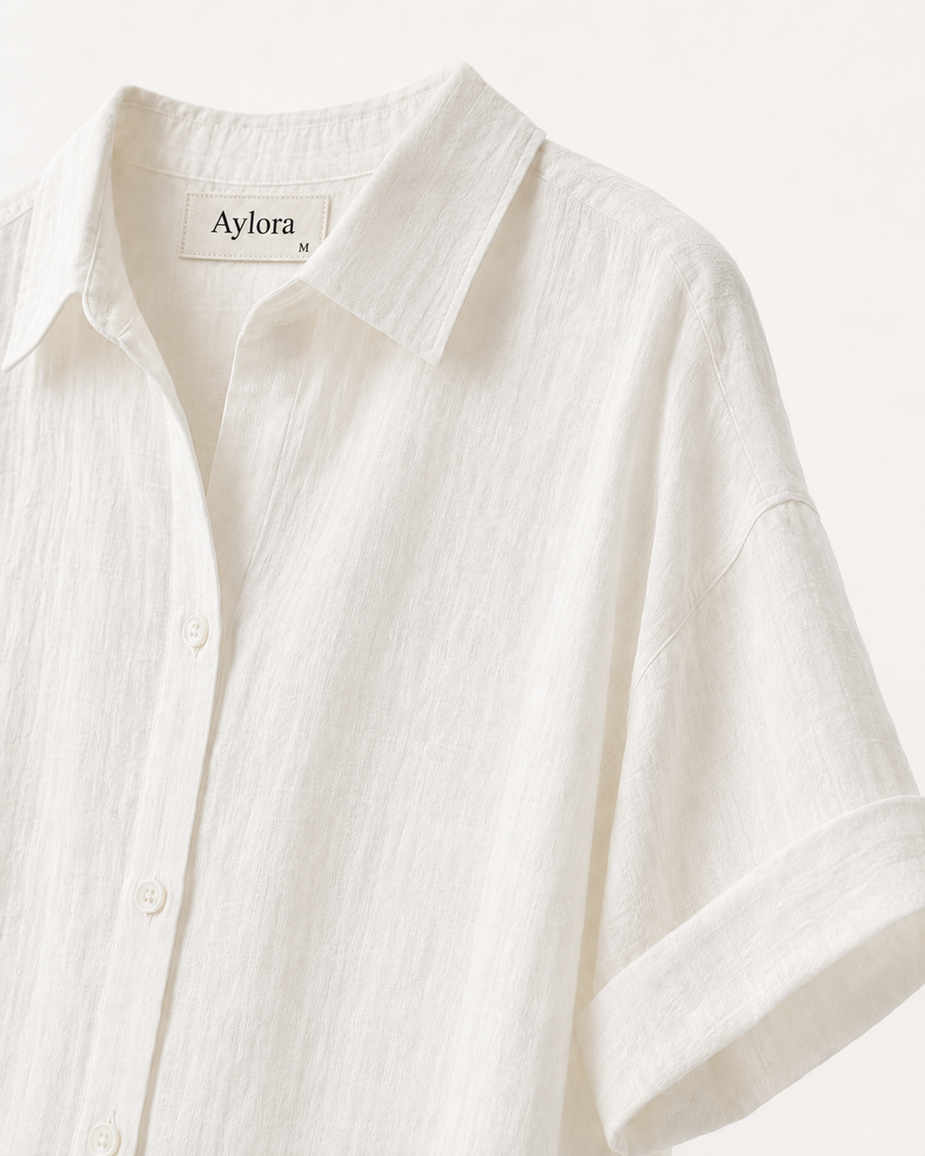 White linen-blend shirt, collar and sleeve detail