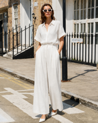White linen-blend shirt and wide-leg pant set styled outdoors