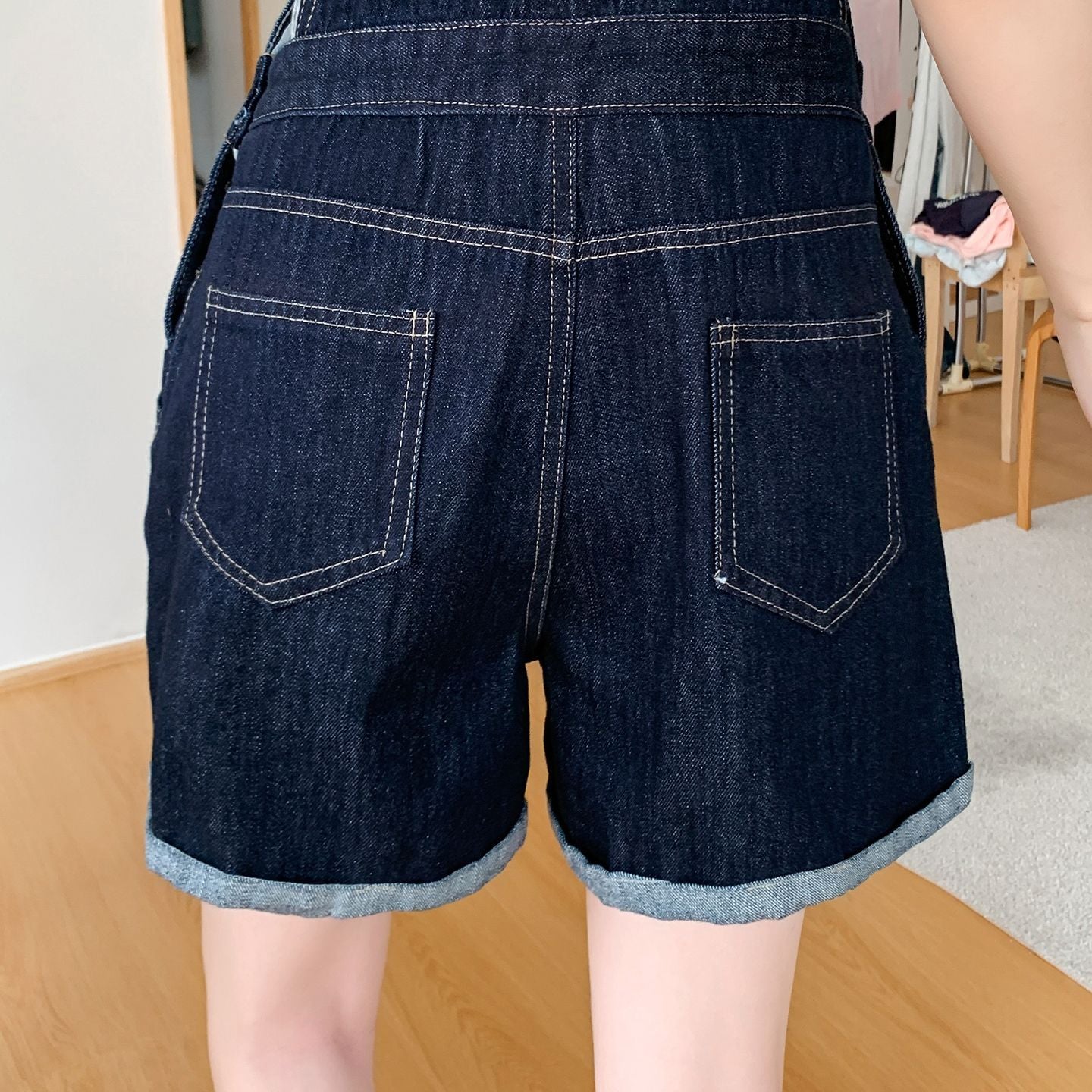 Denim relaxed overall romper, back pocket detail