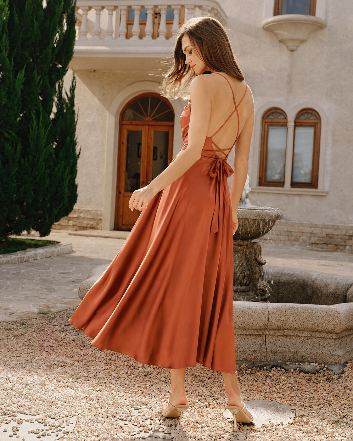 Orange open-back satin-look maxi dress, outdoor back view