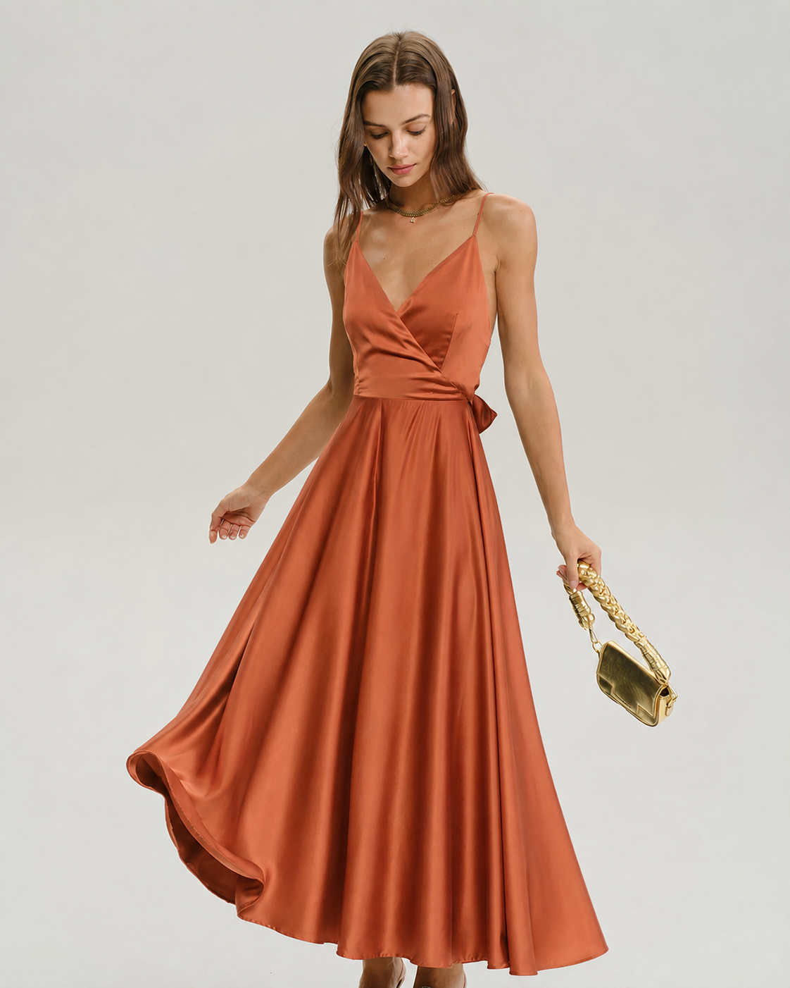 Orange open-back satin-look maxi dress with swishing skirt, front view