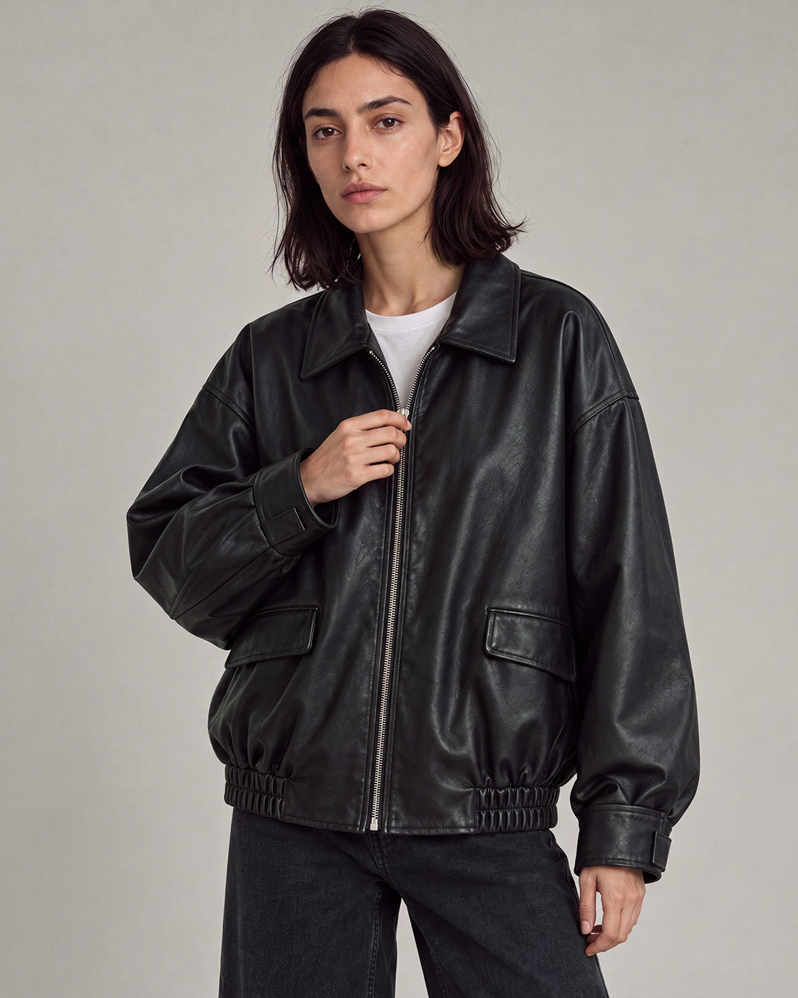 Relaxed Faux-Leather Zip Jacket in Black — model close