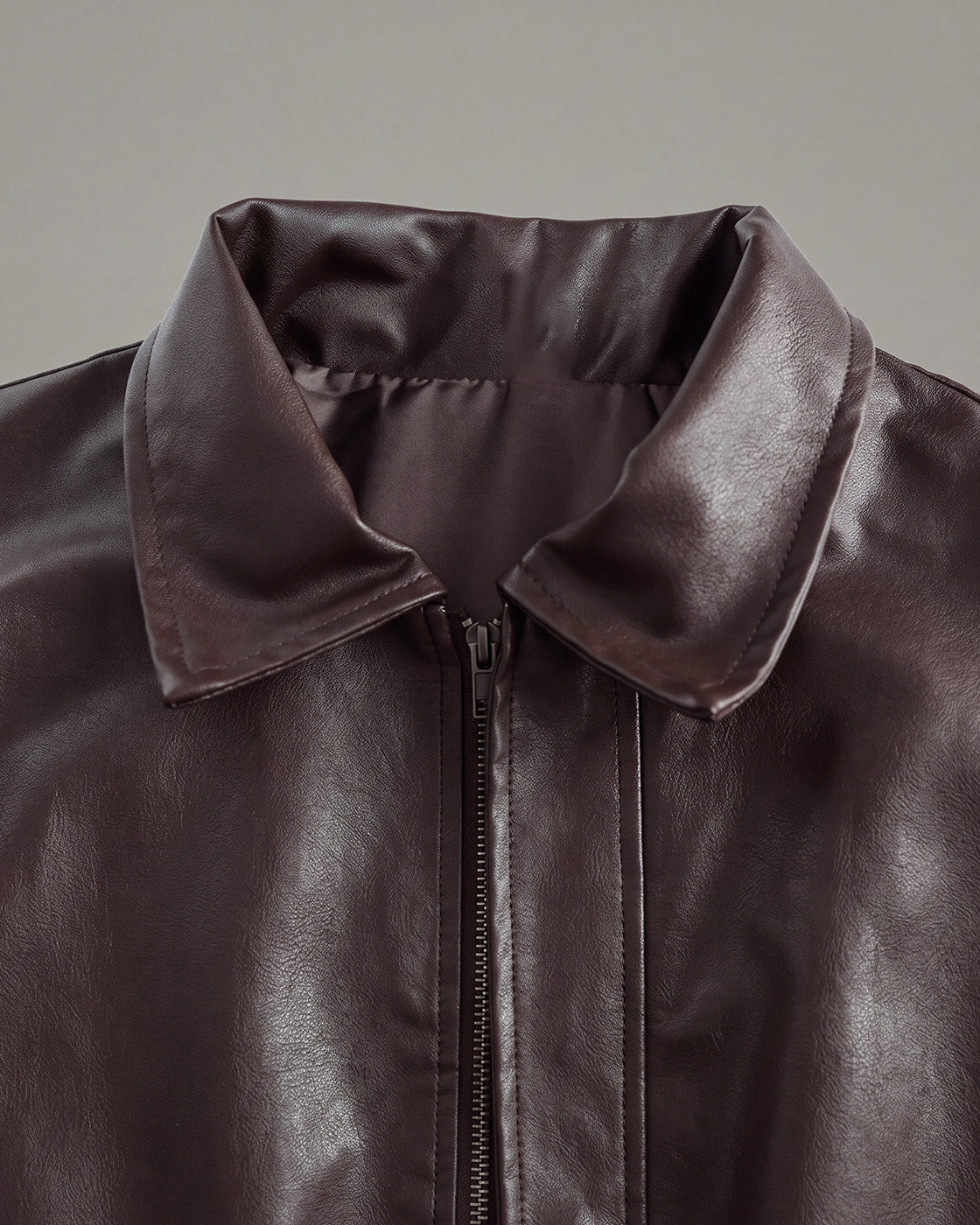 Relaxed Faux-Leather Zip Jacket in Brown — detail collar