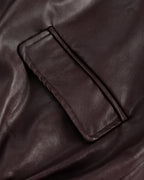 Relaxed Faux-Leather Zip Jacket in Brown — detail pocket hem
