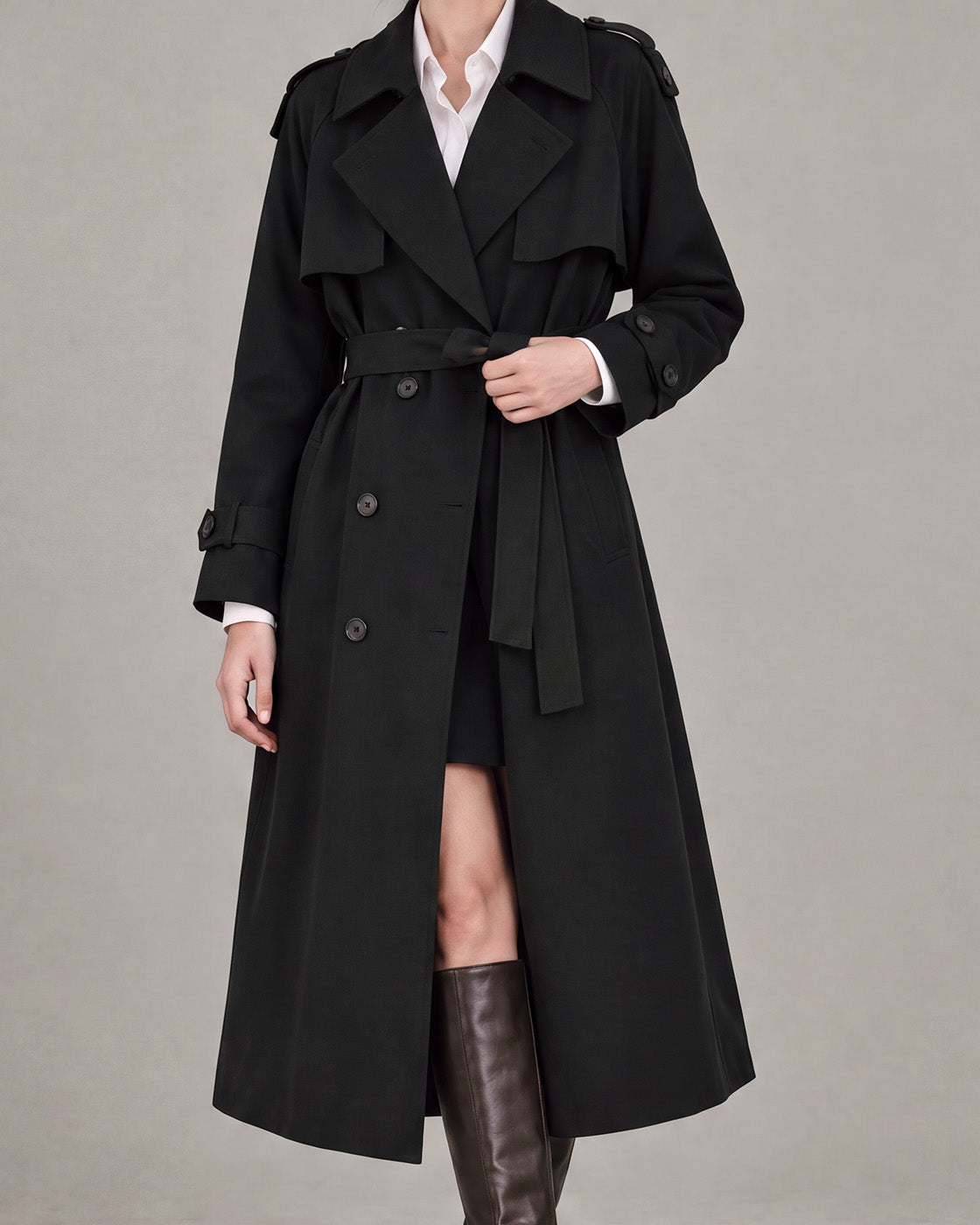 Belted Double-Breasted Trench Coat in Black — neck down