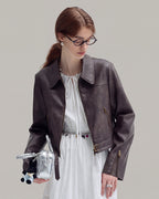 Buckle-Hem Faux-Leather Jacket in Brown — model hero