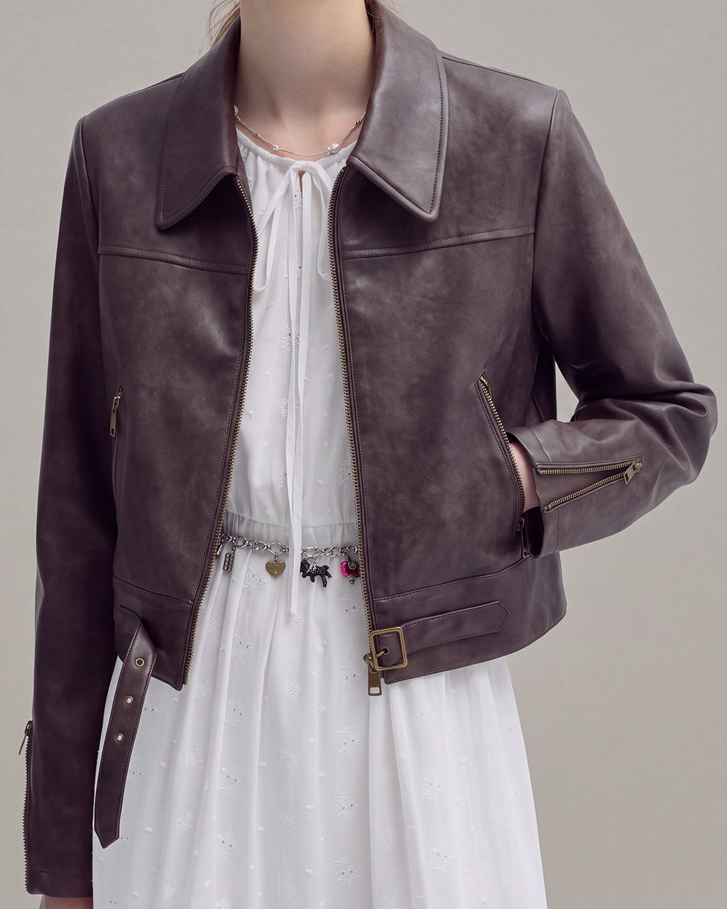 Buckle-Hem Faux-Leather Jacket in Brown — neck down