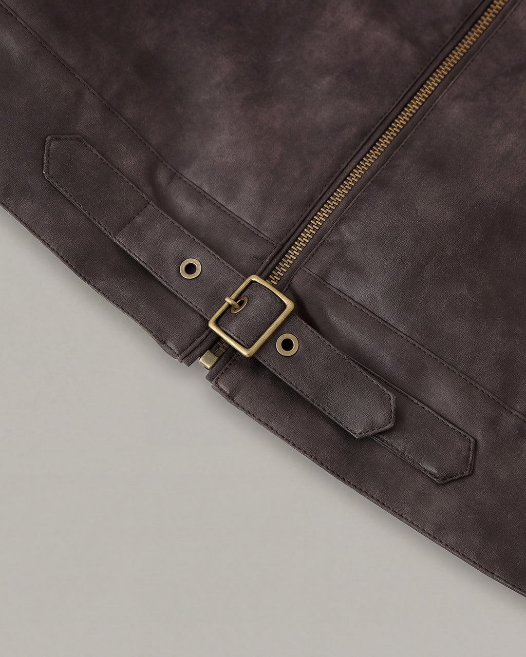 Buckle-Hem Faux-Leather Jacket in Brown — detail buckle