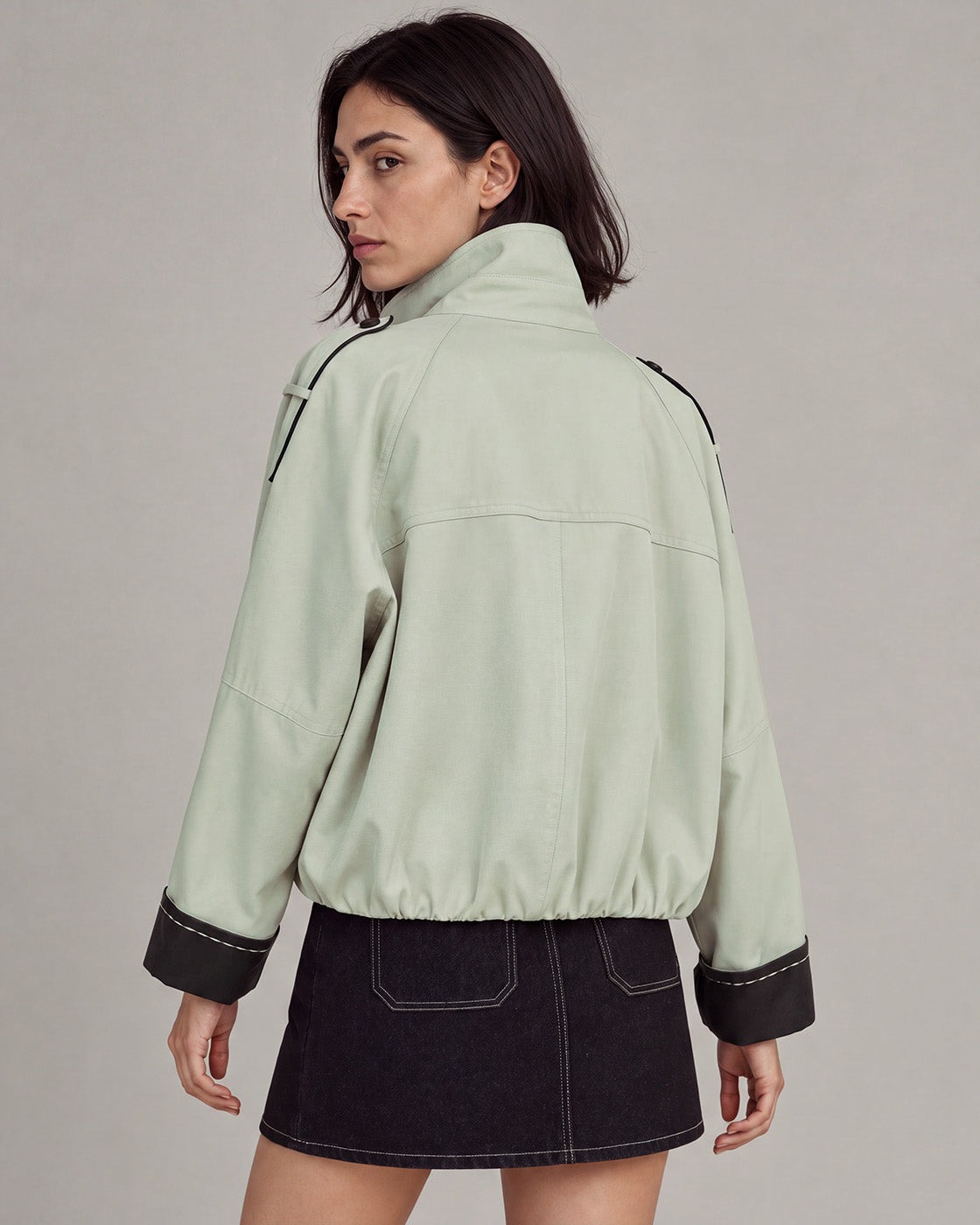 Contrast-Cuff Cropped Trench Jacket in Light Green — model back