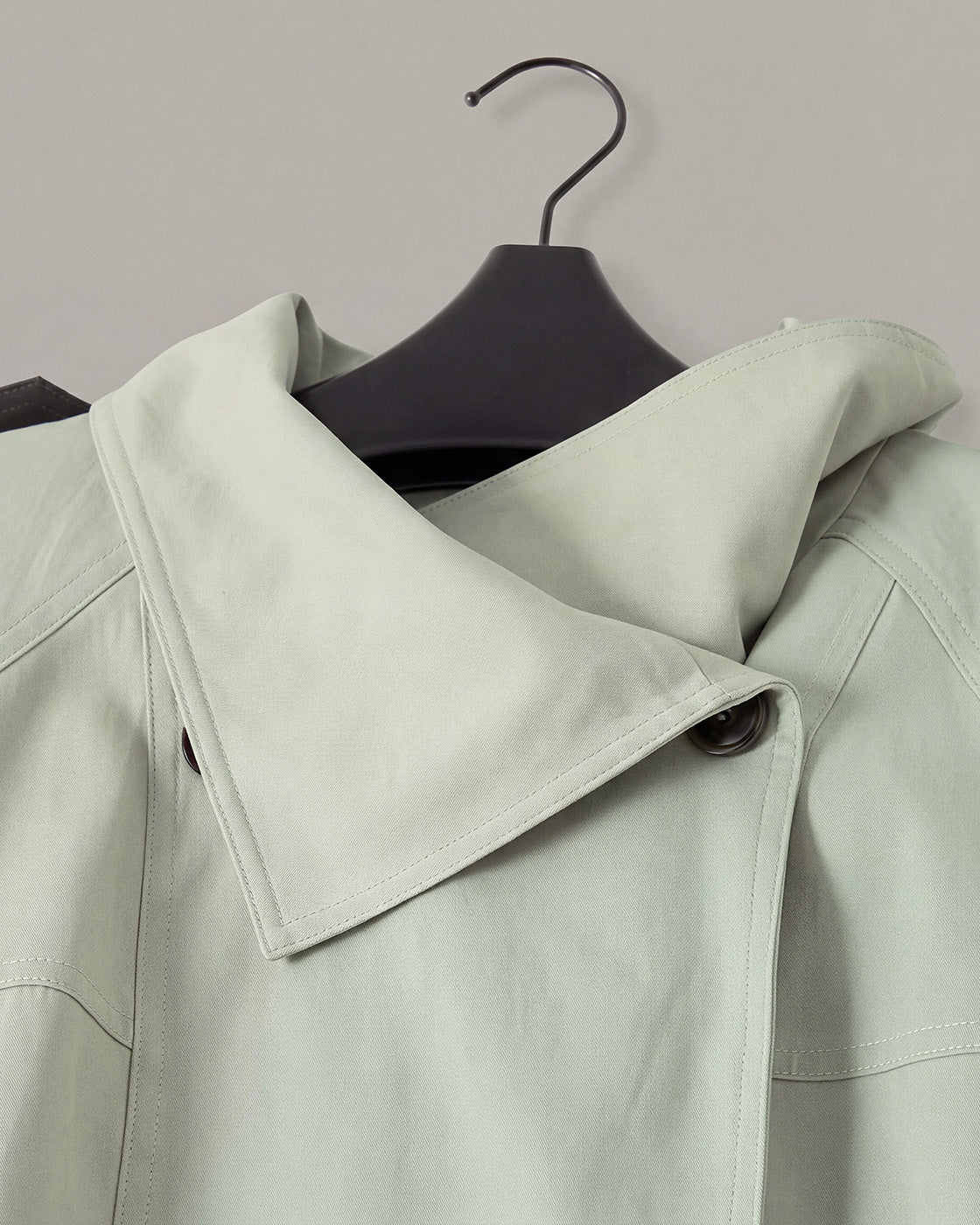 Contrast-Cuff Cropped Trench Jacket in Light Green — detail one