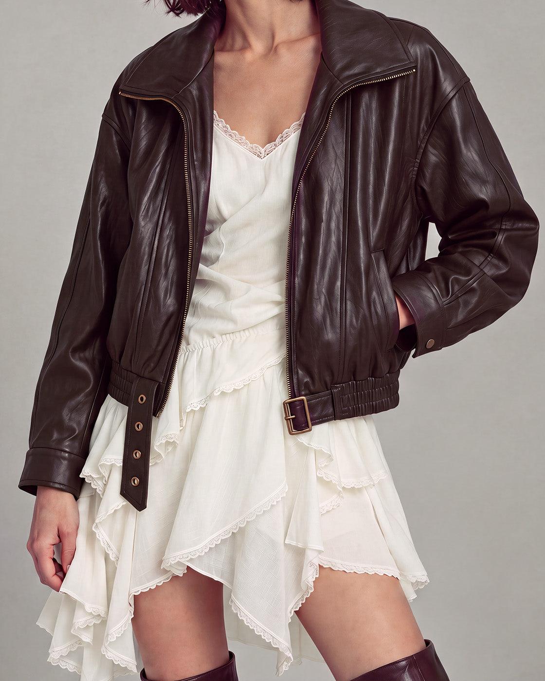 Buckle-Hem Faux-Leather Zip Jacket in Deep Brown — neck down