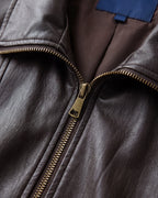 Buckle-Hem Faux-Leather Zip Jacket in Deep Brown — detail one