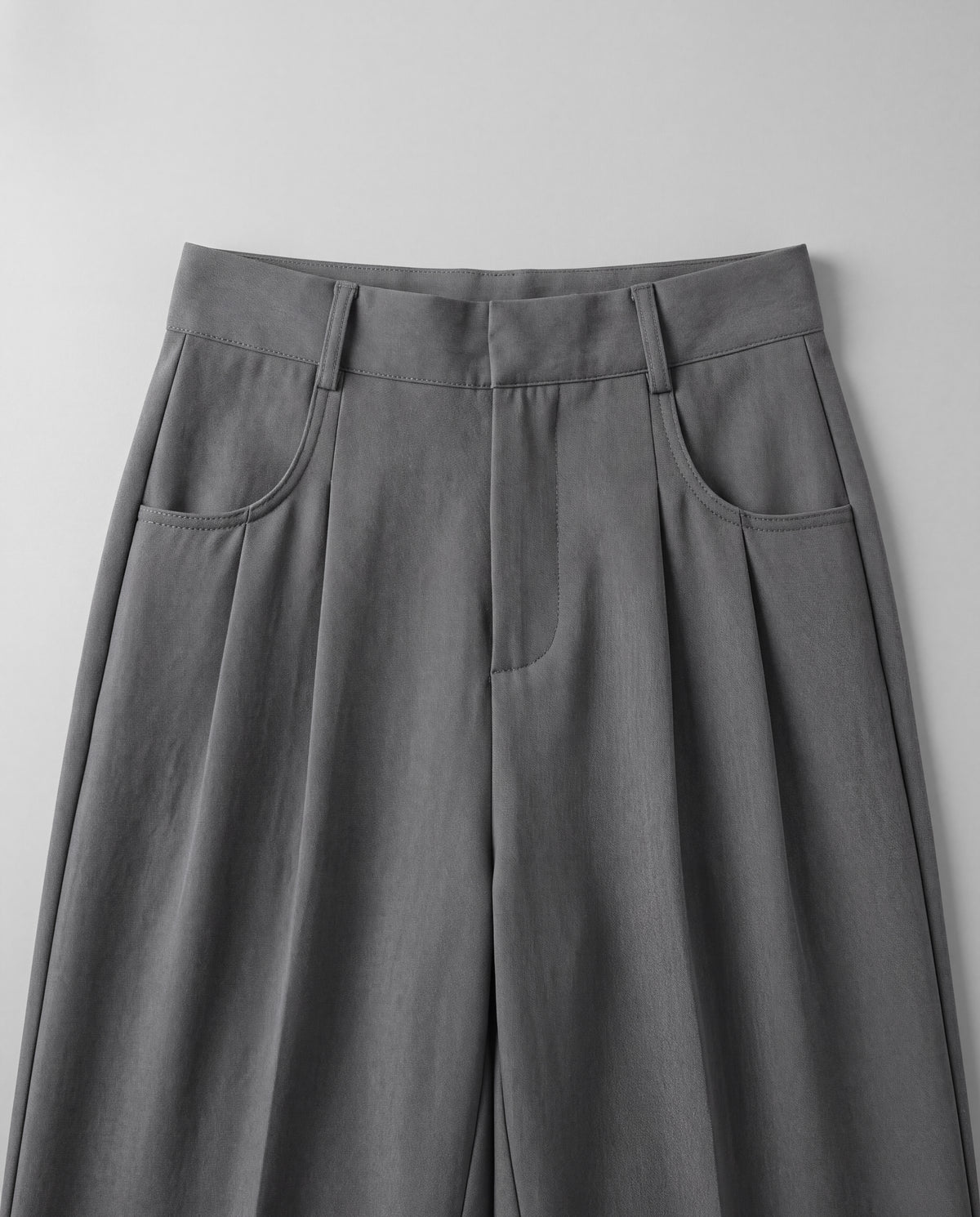 High-Rise Pleated Wide-Leg Trousers — Gray, waistband detail