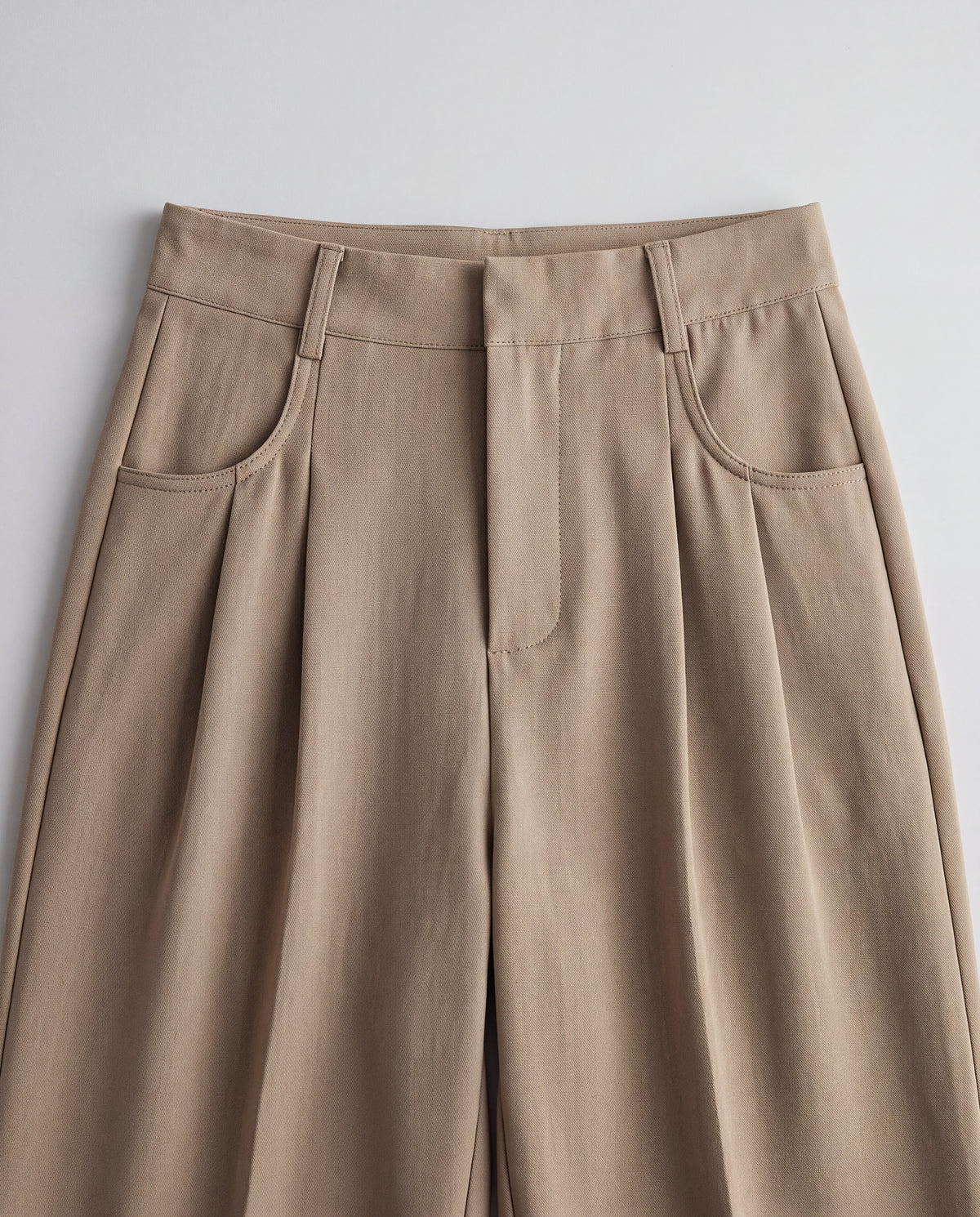 High-Rise Pleated Wide-Leg Trousers — Khaki, waistband detail