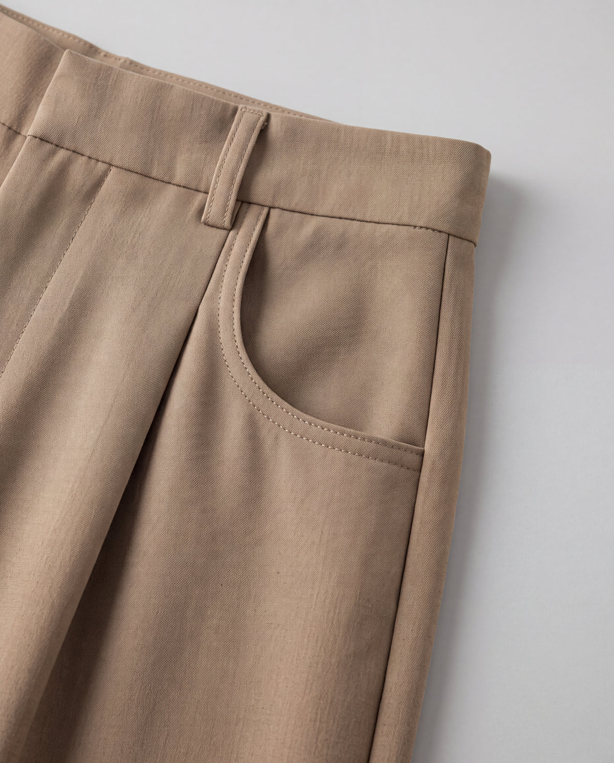 High-Rise Pleated Wide-Leg Trousers — Khaki, pocket detail