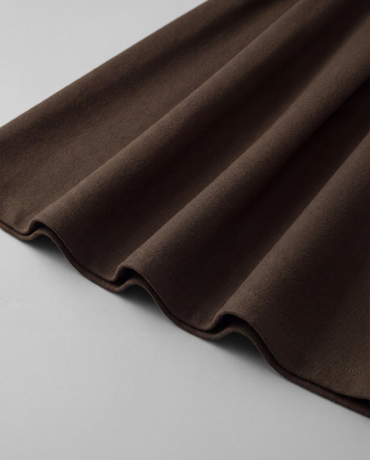 Wool-Look Pleated Midi Skirt — Coffee Brown, hem detail