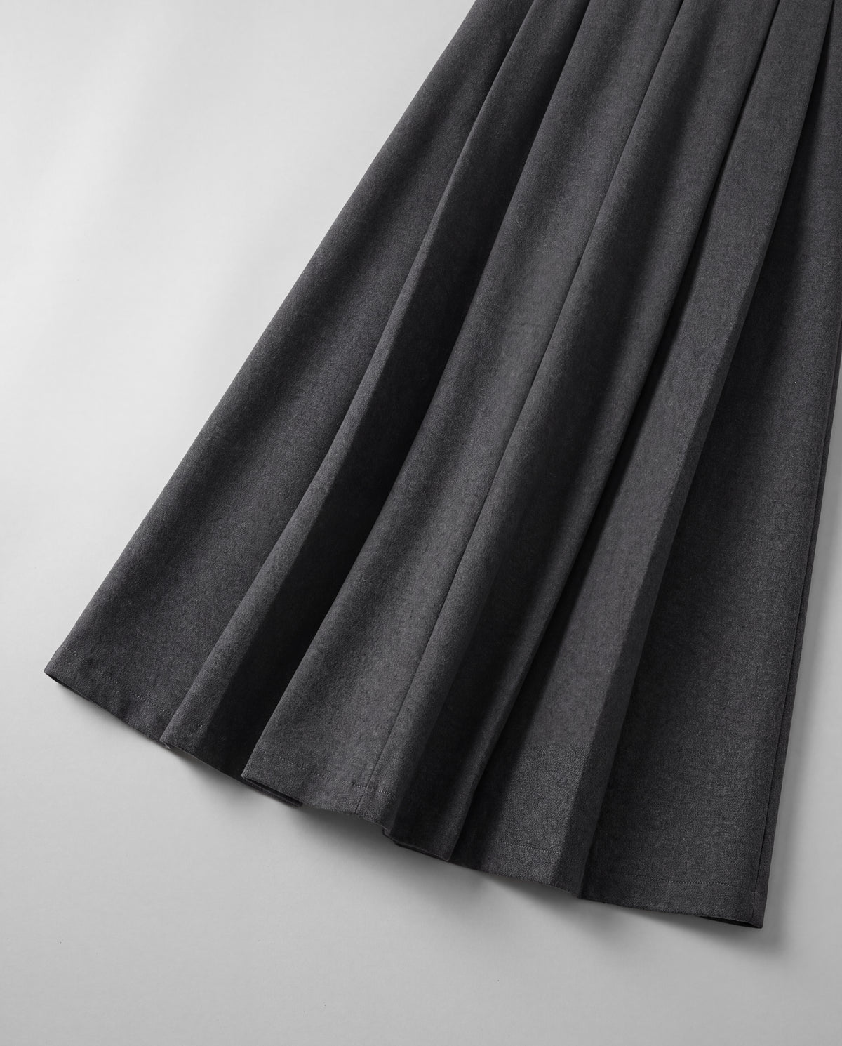 Wool-Look Pleated Midi Skirt — Charcoal Gray, hem detail