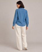 Relaxed Denim Button-Up Shirt — Blue, model back view