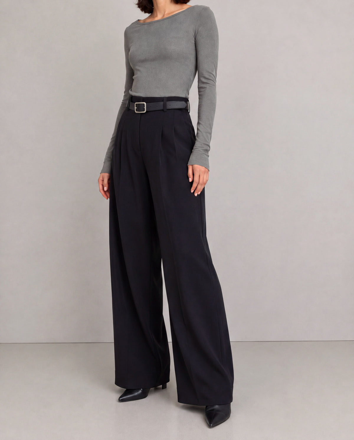 High-Rise Pleated Wide-Leg Trousers — Black, model close view