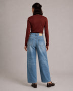 Distressed Barrel-Leg Wide-Leg Jeans — Washed Blue, model back view