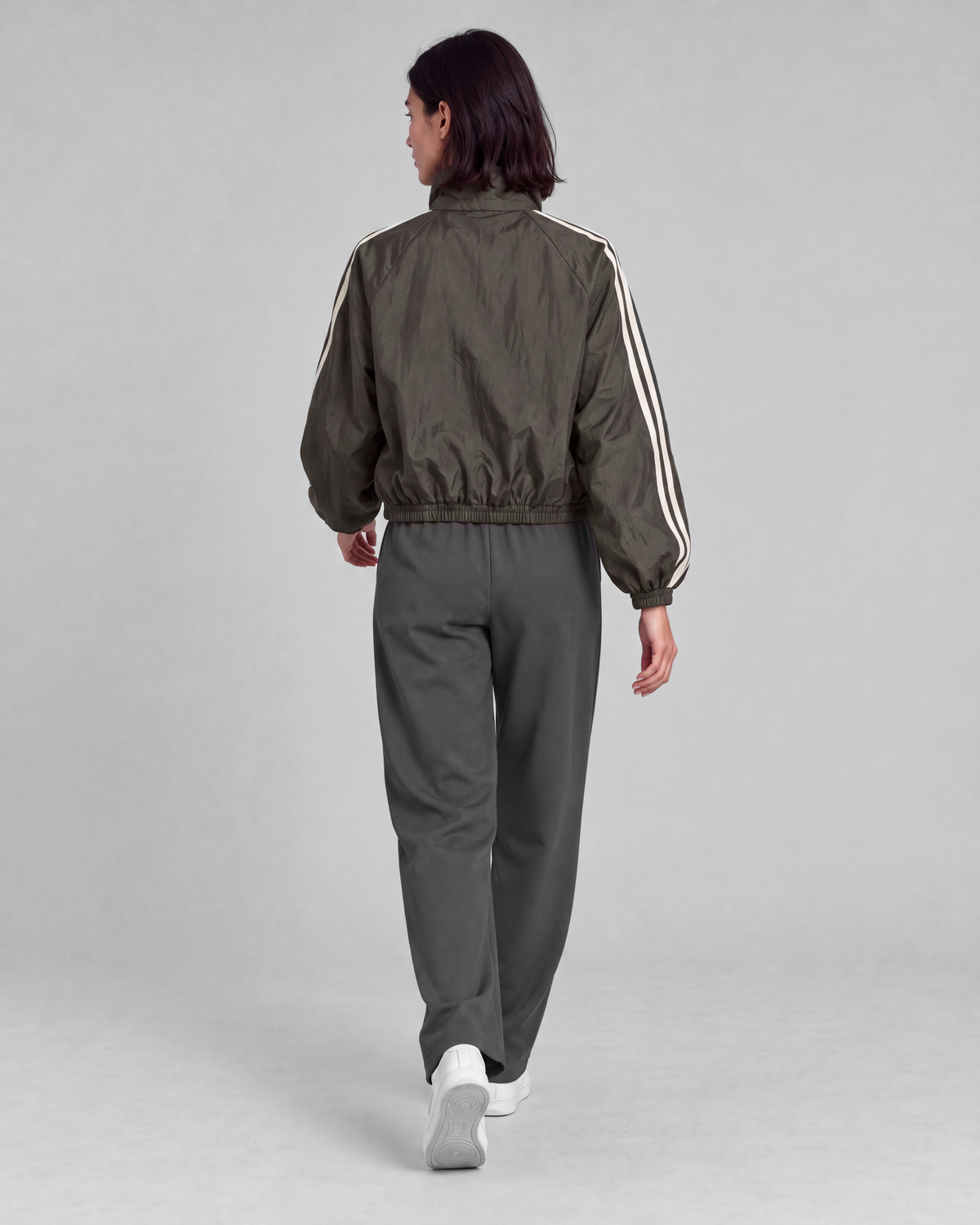 Dark olive-gray jacket, back full-length view on model