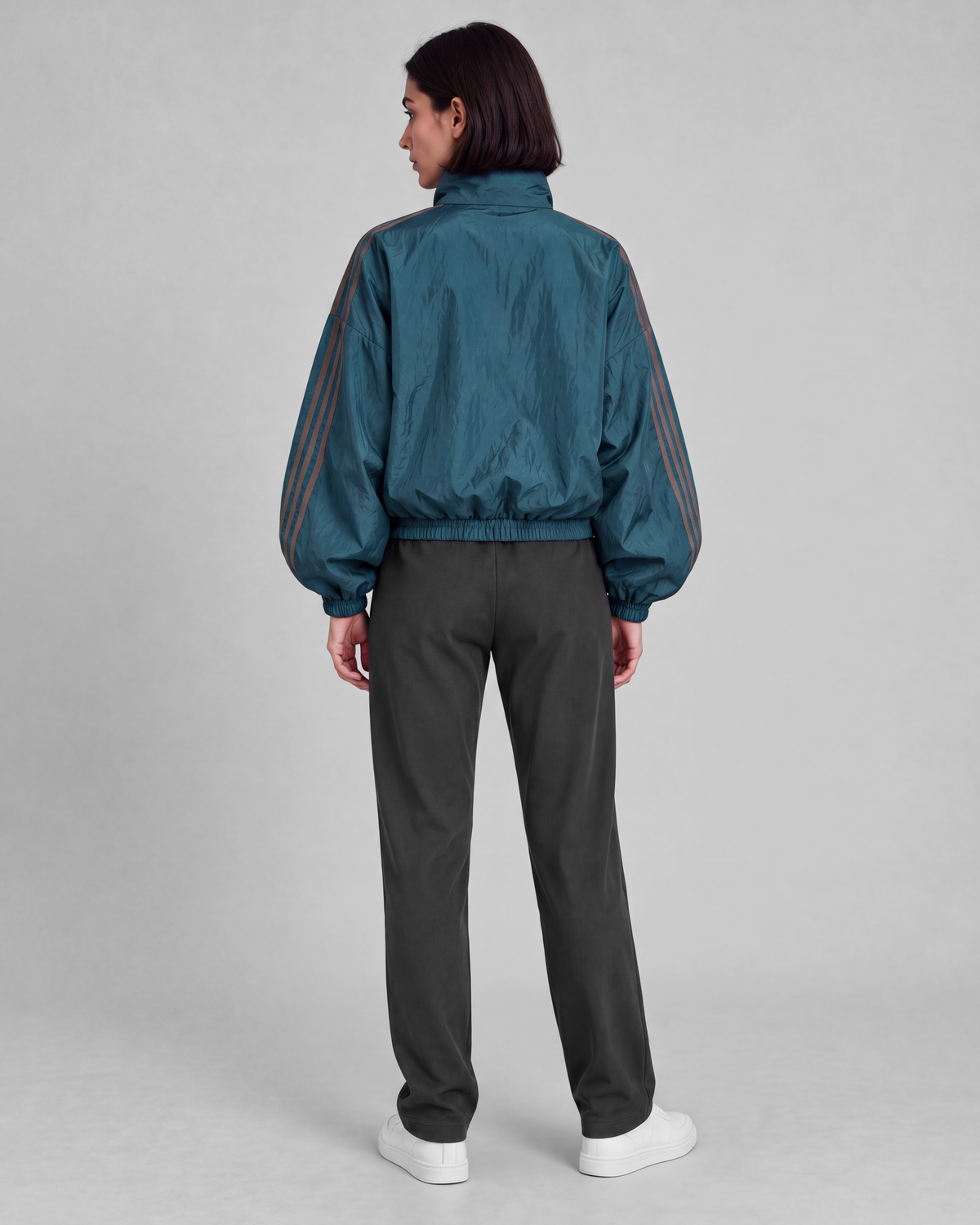 Deep teal jacket, back full-length view on model