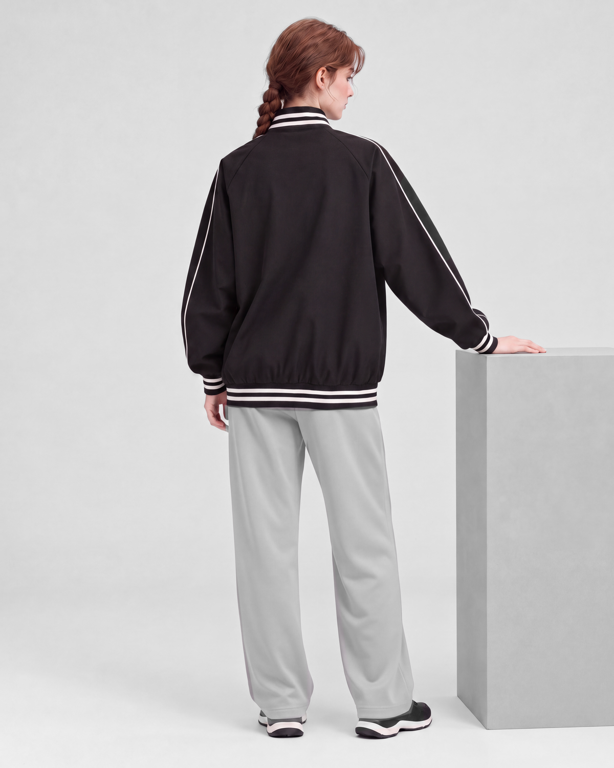 Black jacket, back full-length view on model