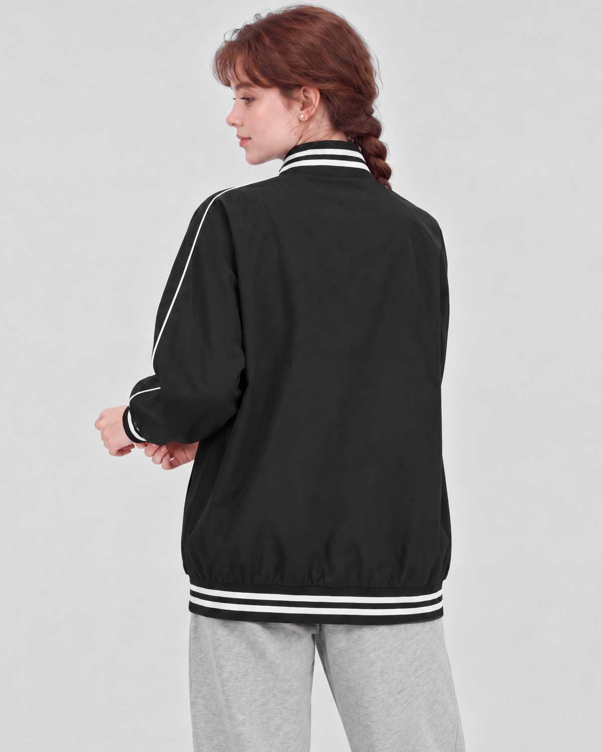 Black jacket, back close view on model