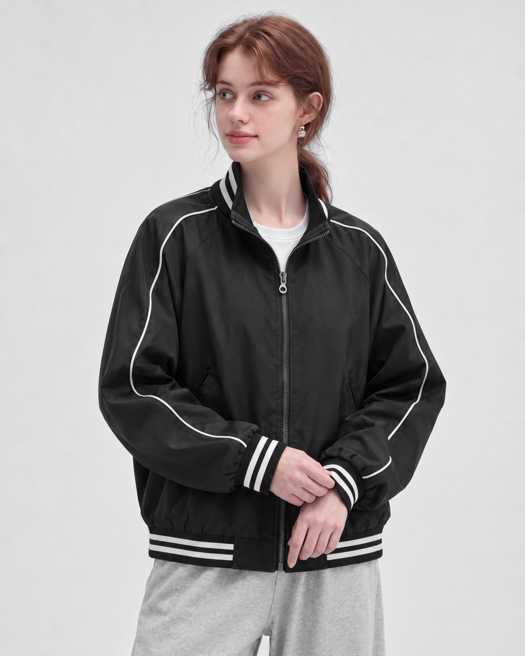 Black jacket, front view on model