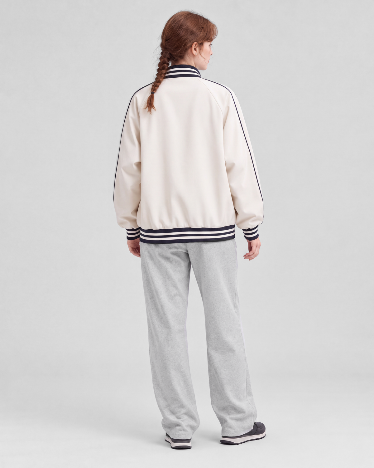Off-white jacket, back full-length view on model
