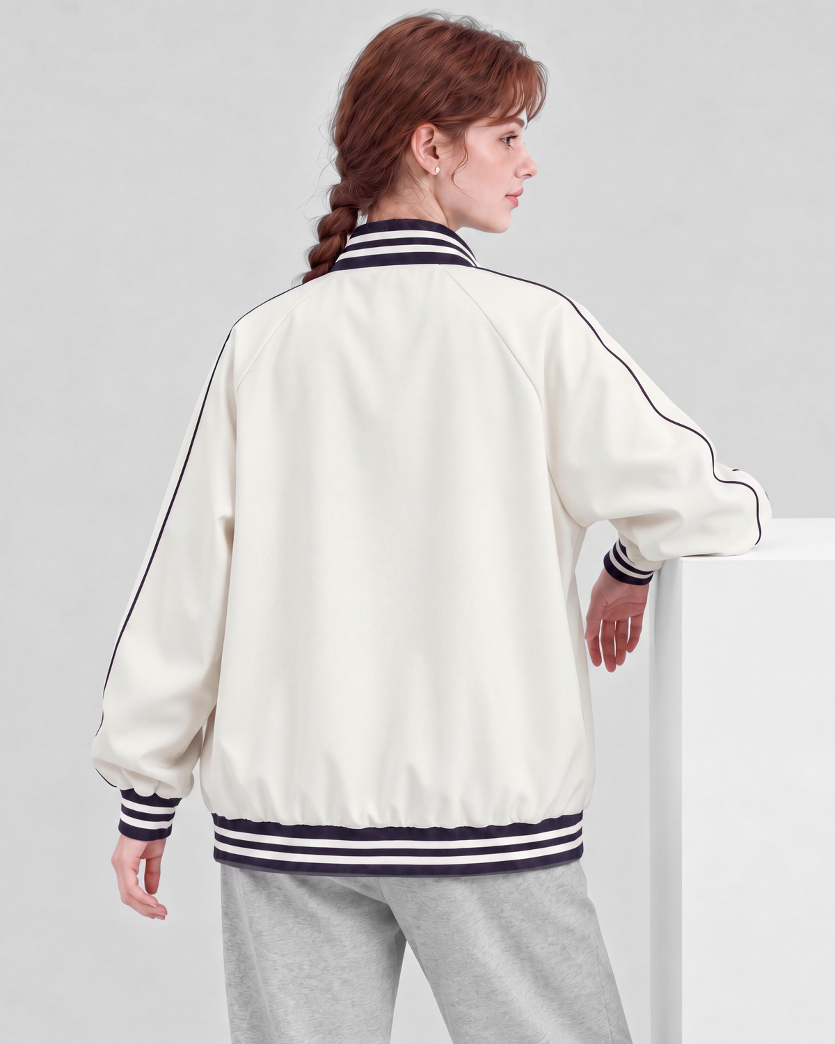 Off-white jacket, back close view on model