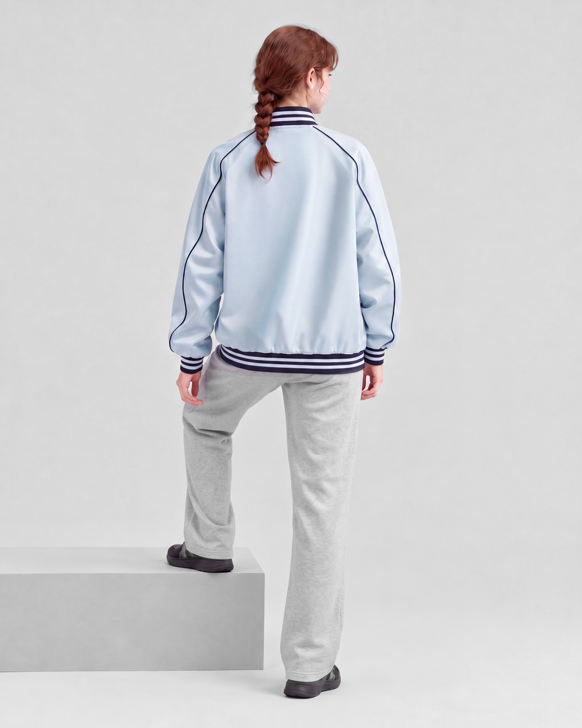 Light blue jacket, back full-length view on model