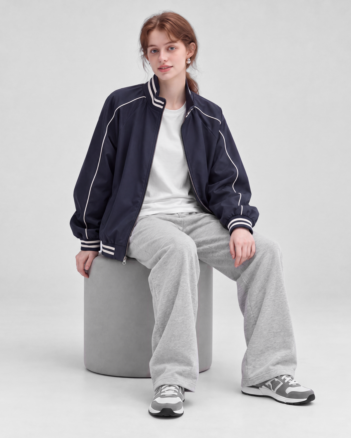 Navy jacket, front full-length view on model