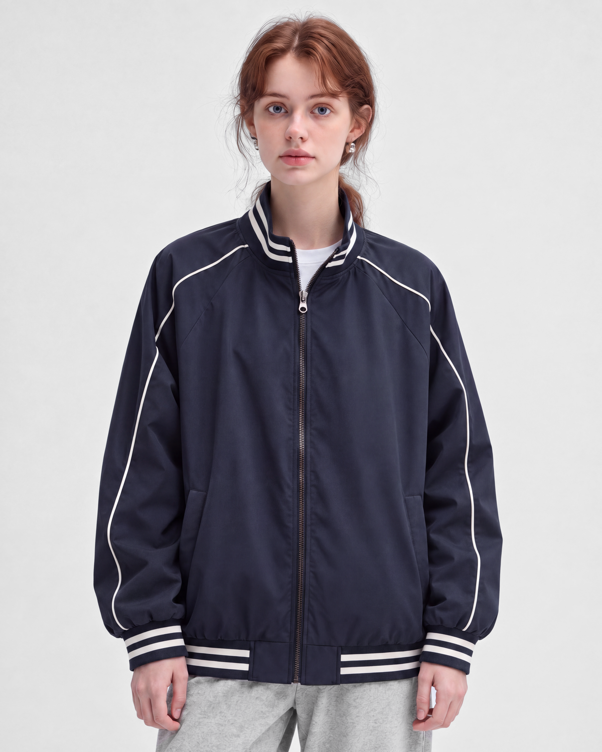 Navy jacket, front view on model