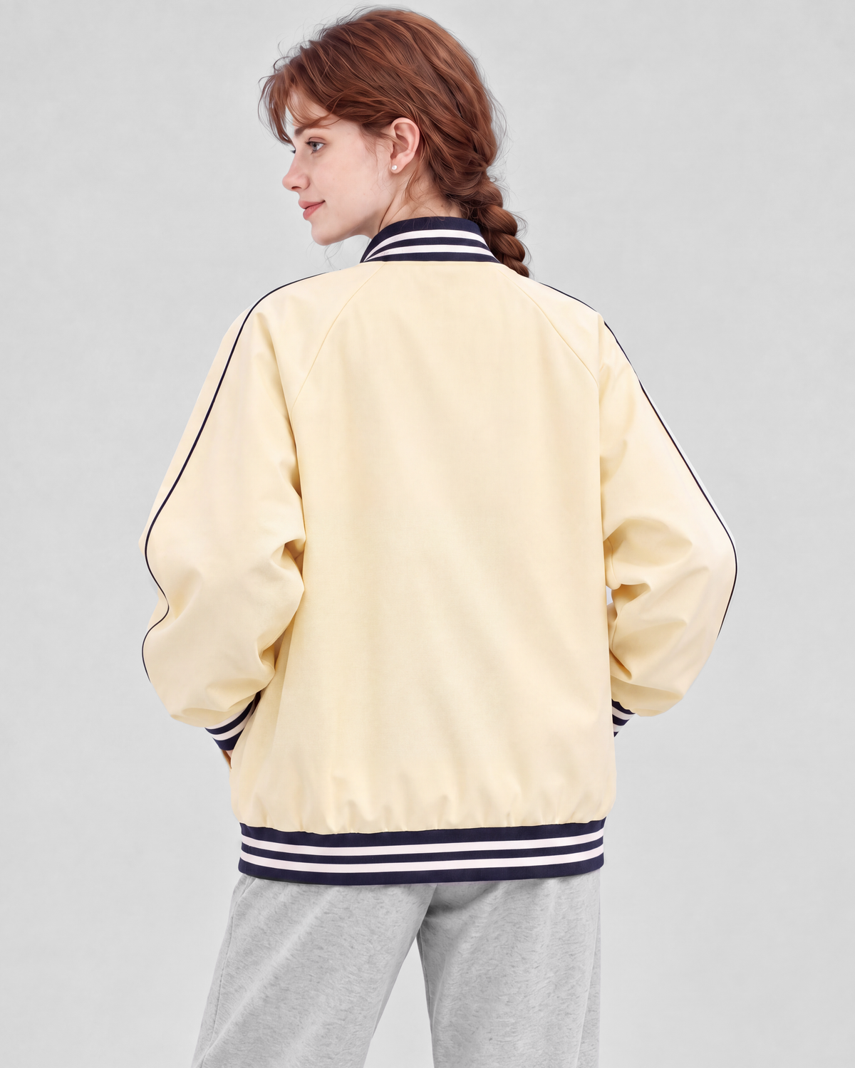 Pale yellow jacket, back close view on model